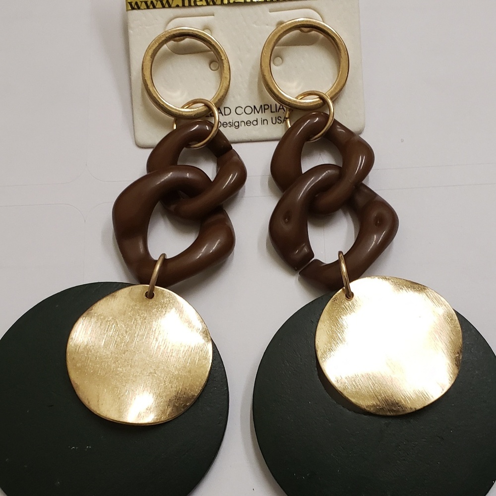 Earrings by: New light ink apparel and accessories